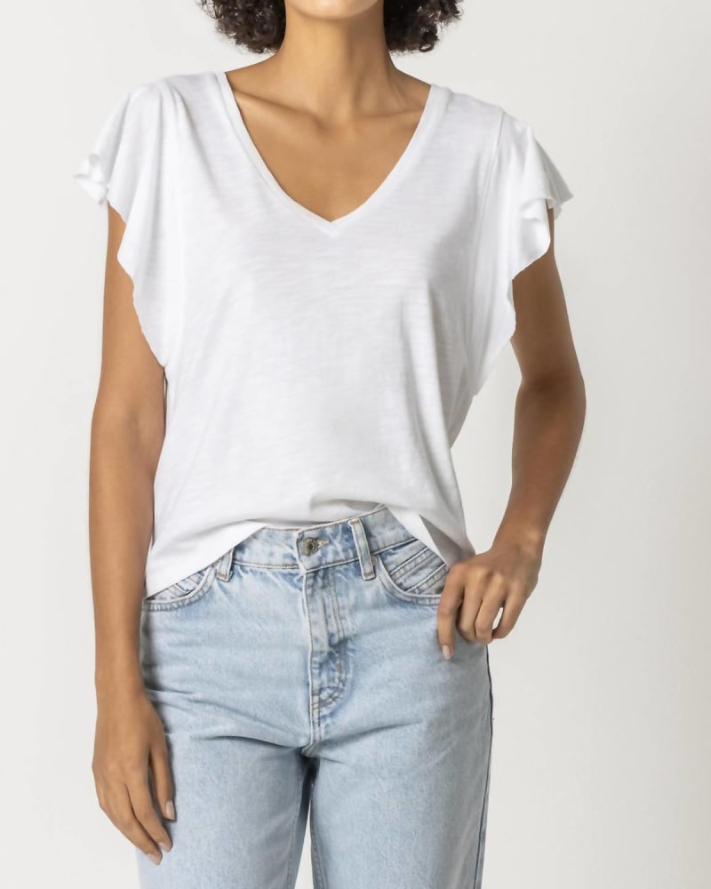 Front of a model wearing a size XL Flutter Sleeve V-Neck Tee in White in White by Lilla P. | dia_product_style_image_id:333864
